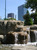 A view of the Atlanta skyline from a tranquil waterfall in Olympic park