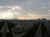 Looking down on early-evening Paris from the top of the Arc